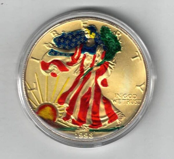 1998 Silver USA Enamelled One Ounce Eagle Coin The liberty is on the obverse, The eagle is on the reverse. The coin contains one ounce of 999 fine silver.