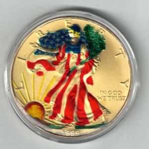 1999 Silver USA Enamelled One Ounce Eagle Coin The liberty is on the obverse, The eagle is on the reverse. The coin contains one ounce of 999 fine silver.