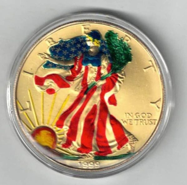 1999 Silver USA Enamelled One Ounce Eagle Coin The liberty is on the obverse, The eagle is on the reverse. The coin contains one ounce of 999 fine silver.