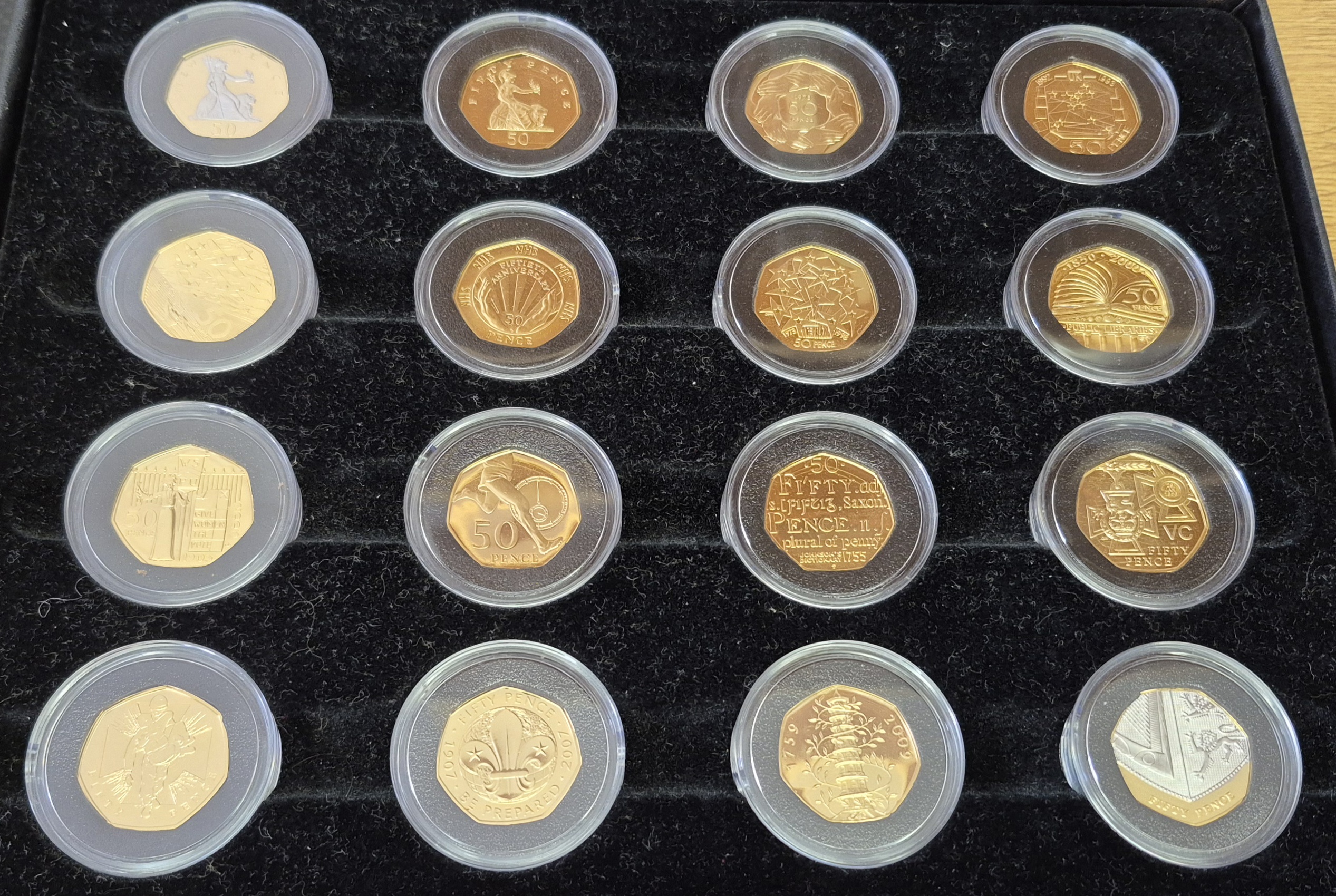 Boxed 2009 Royal Mint Sixteen Coin Fifty Pence Anniversary Proof Set . This 2009 set comes with card box. All coins are in stock for despatch.