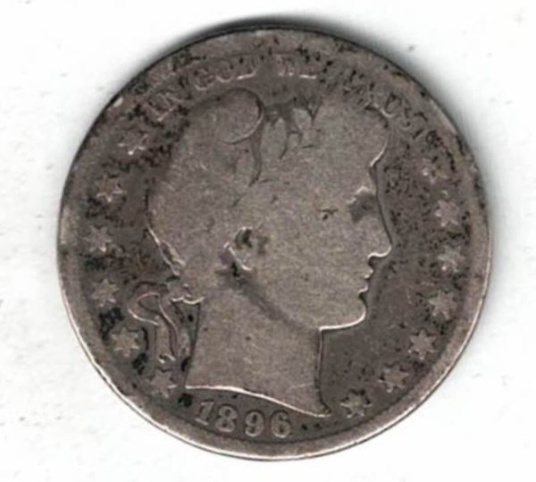 1896 S USA Barber Silver Half Dollar Coin. The reverse features a heraldic eagle with 13 stars above with the denomination below.