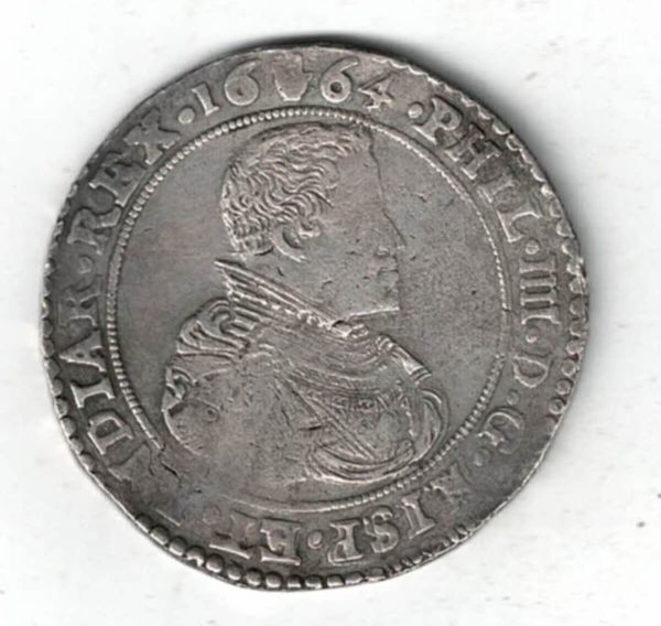 1664 Spanish Netherlands Silver Ducaton Coin. The obverse features the bust of Philip IV facing right. The reverse features the crowned coat of arms.