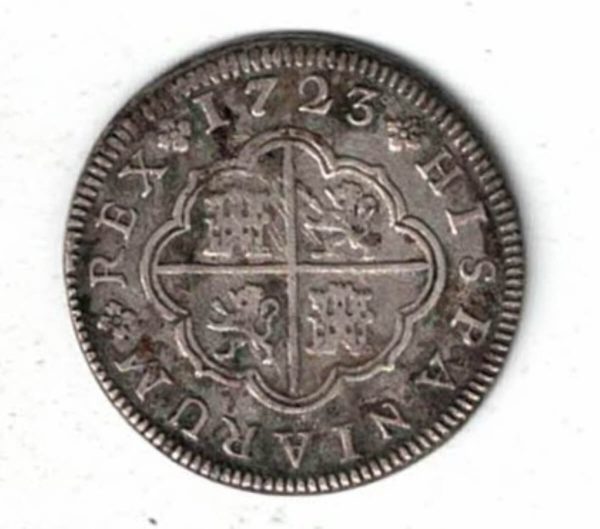1723 F Spain Silver Two Reales Coin. The obverse features the crowned coat of arms of Spain. The reverse features a cross with lions and a castle.