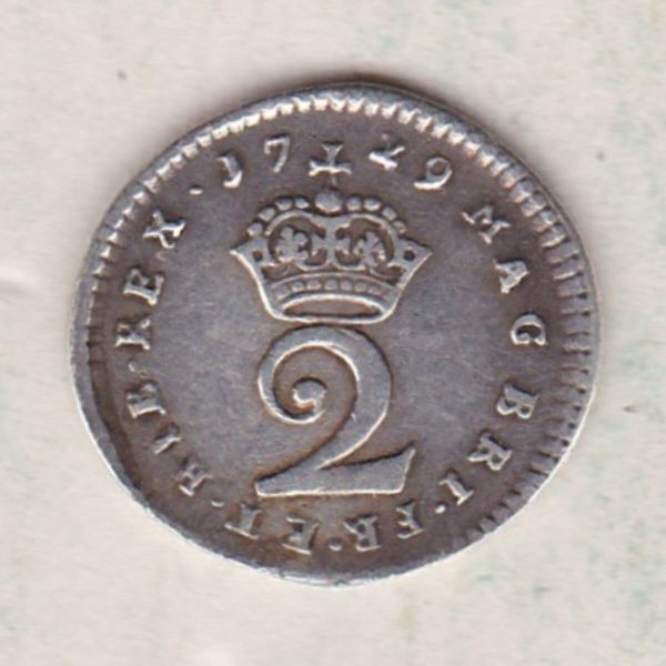1729 Silver Maundy Twopence coin featuring King George II on the obverse. A central denomination below crown dividing the date on the reverse.