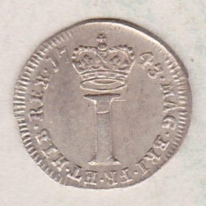 1743 Silver Maundy Penny coin featuring King George II on the obverse. A large central denomination below a crown dividing the date on the reverse.