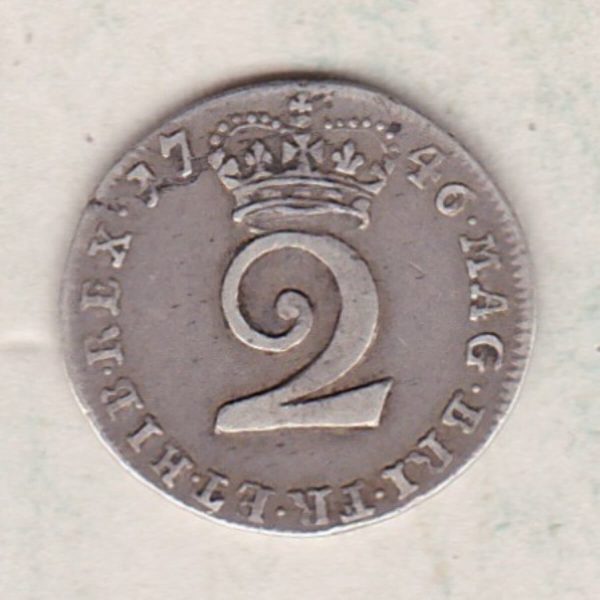 1746 Silver Maundy Twopence coin featuring King George II on the obverse. A central denomination below crown dividing the date on the reverse.