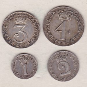 1766 Silver Maundy Set of four coins featuring George III on the Obverse. The Reverse features a central denomination a crown dividing date, legend around.