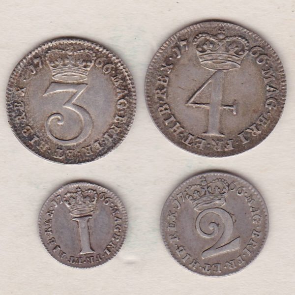 1766 Silver Maundy Set of four coins featuring George III on the Obverse. The Reverse features a central denomination a crown dividing date, legend around.