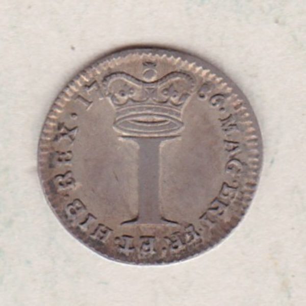 1786 Silver Maundy Penny coin featuring King George III on the obverse. A large central denomination below a crown dividing the date on the reverse.