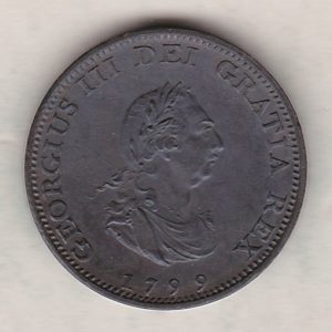 1799 copper farthing coin featuring the portrait of King George III on the Obverse. Britannia seated facing left on the Reverse.