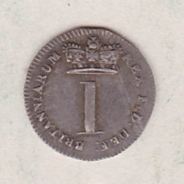 1820 Silver Maundy Penny coin featuring King George III on the obverse. A central crowned denomination with legend around on the reverse.