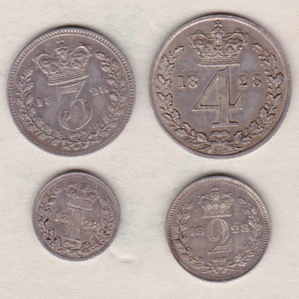 1828 Silver Maundy Set of four coins featuring George IV on the Obverse. The Reverse features a crowned denomination dividing date within oak wreath. 