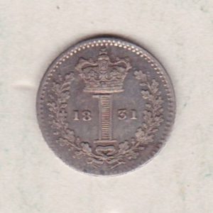1831 Silver Maundy Penny coin featuring King William IV on the obverse. A central crowned denomination above the date on the reverse.