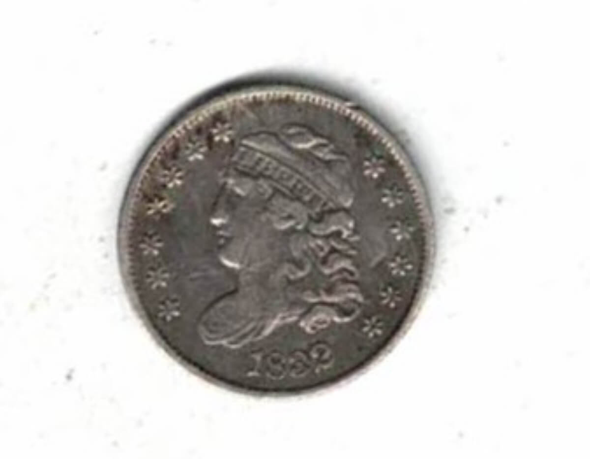 1832 USA Liberty Capped Bust Silver Half Dime Coin. The Obverse features a Liberty Capped head facing left. The reverse features an eagle with arrows.