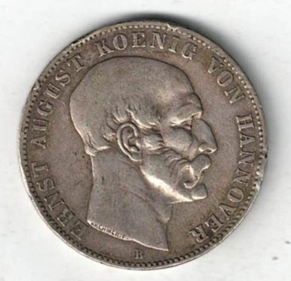 1849 B Germany Hannover Silver Thaler Coin. The obverse features Ernest August facing right. The reverse features the crowned coat of arms with date below. 