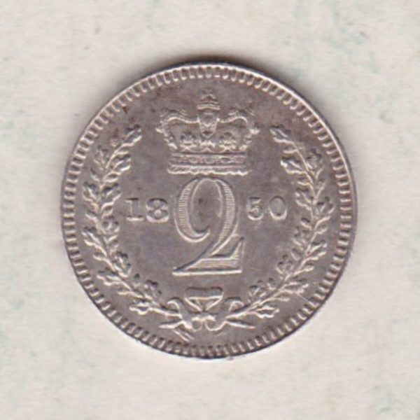 1850 Silver Maundy Twopence coin featuring Queen Victoria on the obverse. A crowned denomination dividing the date on the reverse.