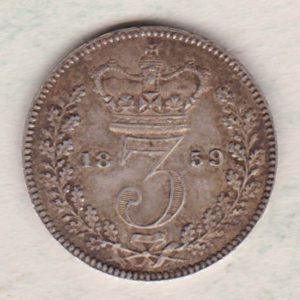 1859 Silver Maundy Threepence coin featuring Queen Victoria on the obverse. The reverse features a crowned denomination dividing date within an oak wreath. 