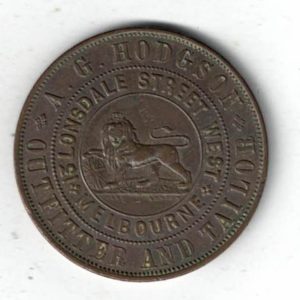 1860 Australia AG Hodgson Copper Penny Token. The obverse features a lion with text around. The reverse features a lady sitting down with scales and boat.