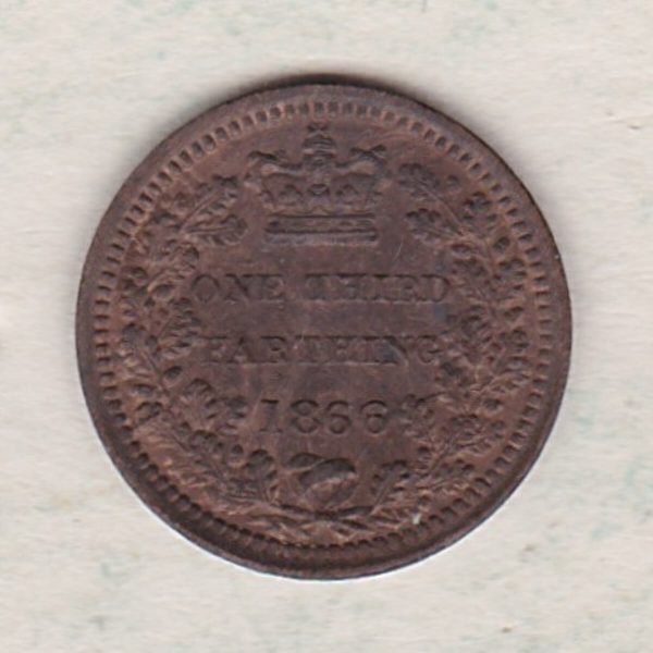 1866 Bronze Third Farthing the portrait of Queen Victoria on the obverse. The reverse shows the crowned value and date within an laurel wreath.