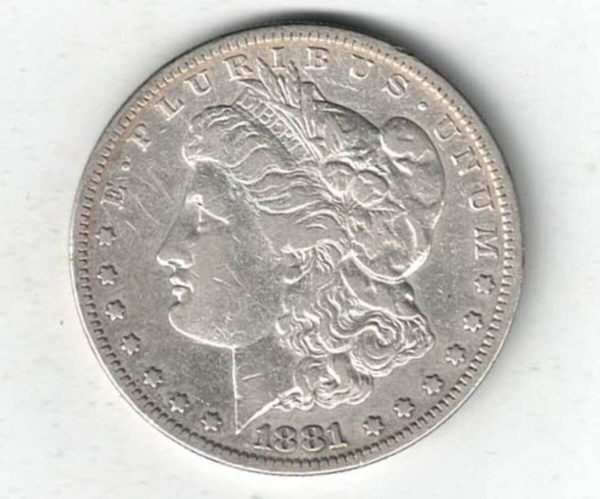 1881 S Silver USA Morgan Dollar coin featuring lady liberty on the obverse. The eagle holding arrows and an olive branch on the reverse.