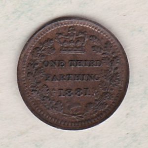 1881 Bronze Third Farthing the portrait of Queen Victoria on the obverse. The reverse shows the crowned value and date within an laurel wreath.