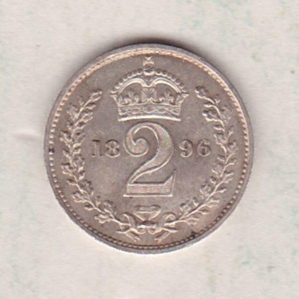 1896 Silver Maundy Twopence coin featuring Queen Victoria on the obverse. A crowned denomination dividing the date on the reverse.