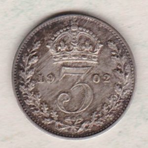1902 Silver Maundy Threepence coin featuring King Edward VII on the obverse. The reverse features a crowned denomination dividing date within an oak wreath. 