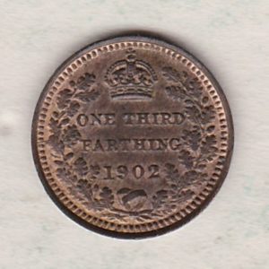 1902 Bronze Third Farthing the portrait of King Edward VII on the obverse. The reverse shows the crowned value and date within an laurel wreath.