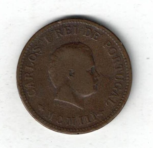 1903 Portuguese India Bronze Half Tanga Coin. The obverse features the portrait of Charles I. The reverse features the crowned arms with denomination.
