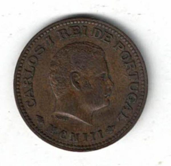 1903 Portuguese India Bronze Quarter Tanga Coin. The obverse features the portrait of Charles I. The reverse features the crowned arms with denomination.