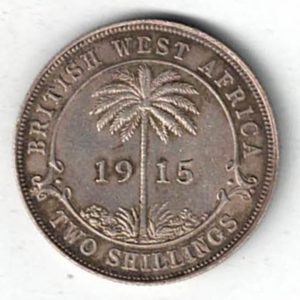 1915 H British West Africa Silver Two Shillings Coin. The obverse features the bust of king George V facing left. The reverse features a palm tree.