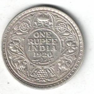 1920 India Silver One Rupee Coin. The obverse features George V. The reverse features The reverse has the denomination and date within circle.