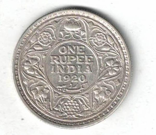 1920 India Silver One Rupee Coin. The obverse features George V. The reverse features The reverse has the denomination and date within circle.