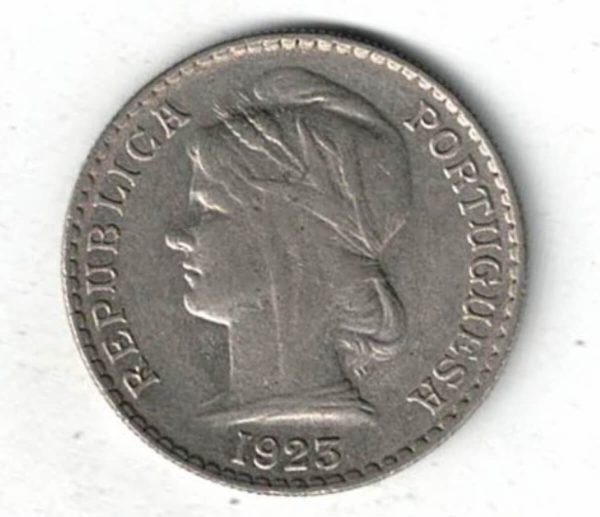 1923 Angola Fifty Centavos Coin. The obverse features a head facing left. The reverse features arms with value in legend.