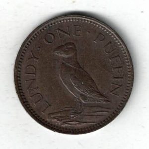 1929 Lundy Bronze Puffin Coin. The obverse features Martin Coles Harman, with the date 1929 below.  The reverse side of the coin features a Puffin.