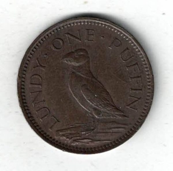 1929 Lundy Bronze Puffin Coin. The obverse features Martin Coles Harman, with the date 1929 below.  The reverse side of the coin features a Puffin.