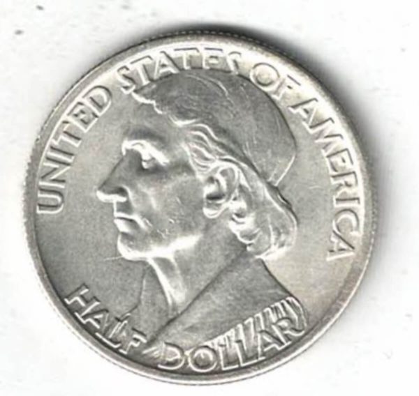 1935 USA Boone Bicentennial Silver Half Dollar Coin. The obverse features a frontiersman holding a chart of Kentucky and a musket. The reverse Daniel Boone 