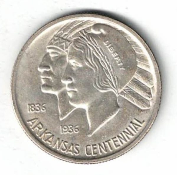 1936 USA Arkansas 100th Anniversary Silver Half Dollar Coin. The obverse features a liberty and Indian head facing left. The reverse features an eagle.