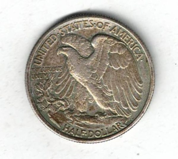1939 USA Walking Liberty Silver Half Dollar Coin. The obverse features walking Liberty with date below. The reverse features an eagle with value below.