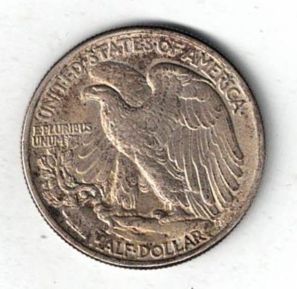 1944 USA Walking Liberty Silver Half Dollar Coin. The obverse features walking Liberty with date below. The reverse features an eagle with value below.