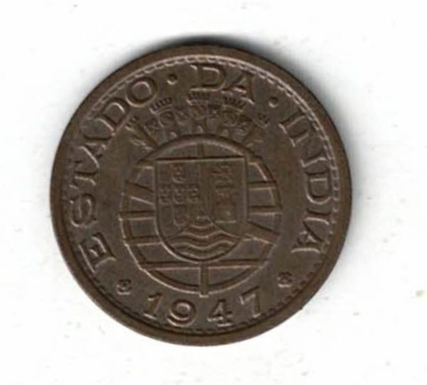 1947 Portuguese India Bronze One Tanga Coin. The obverse features small towers with shields. The reverse the denomination.