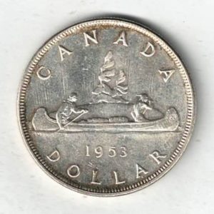 1953 Canada Silver One Dollar Coin. The obverse side of the coin features George VI facing left. The reverse features an aboriginal traveling by canoe.