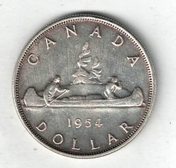 1954 Canada Silver One Dollar Coin. The obverse side of the coin features George VI facing left. The reverse features an aboriginal traveling by canoe.