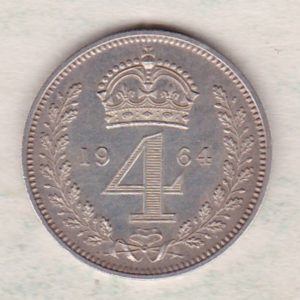1964 silver maundy fourpence coin featuring Queen Elizabeth II on the Obverse. The crowned denomination dividing date within an oak wreath on the Reverse.