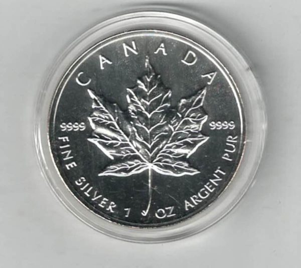 1995 Silver Canada One Ounce Maple. Elizabeth II is on the obverse, The Maple is on the reverse. The coin contains one ounce of 9999 fine silver.