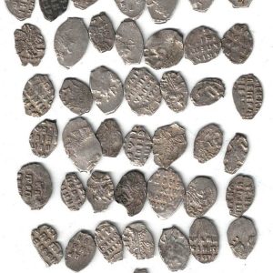 Forty Four 1701 Russia Silver One Kopeck Coins. The obverse side of these coins feature a horseman with a spear. The reverse features inscriptions.