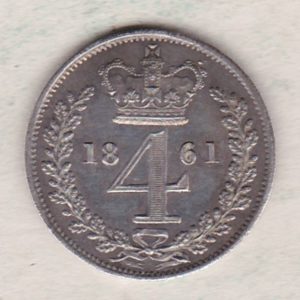 1861 silver maundy fourpence coin featuring Queen Victoria on the Obverse. The crowned denomination dividing date within an oak wreath on the Reverse.