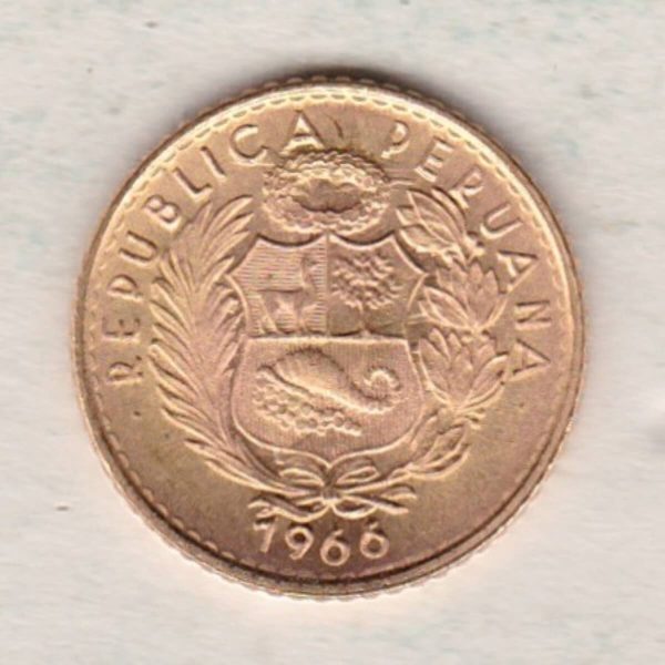 1966 Peru Gold Five Soles coin. The obverse features the National arms. The reverse features Liberty seated facing right.