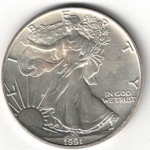 1991 Silver USA One Ounce Eagle. The liberty is on the obverse, The eagle is on the reverse. The coin contains one ounce of 999 fine silver.