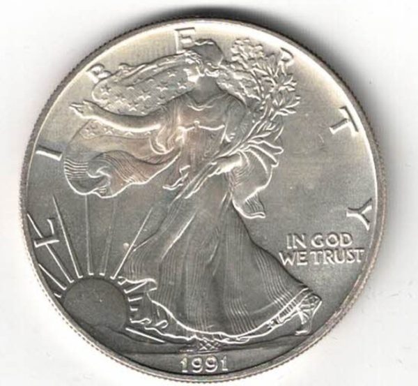 1991 Silver USA One Ounce Eagle. The liberty is on the obverse, The eagle is on the reverse. The coin contains one ounce of 999 fine silver.